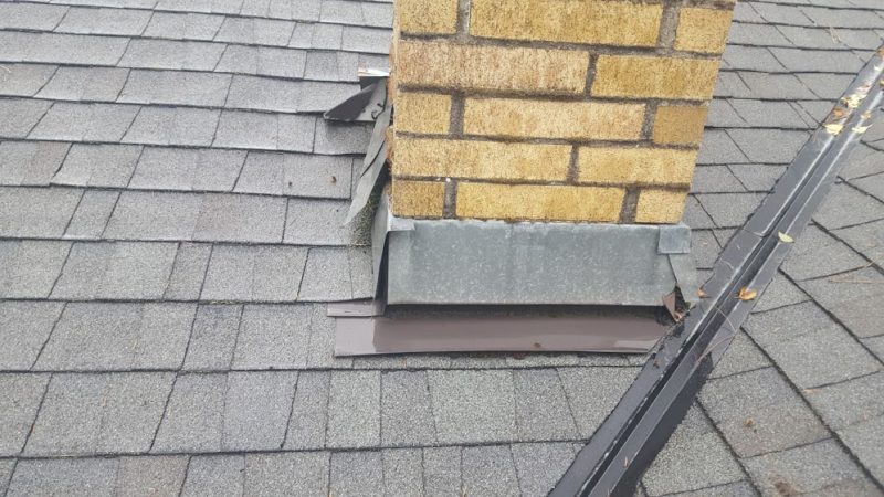 Bent-unwrapped-uncaulked-flashing-e1608425958795